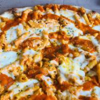 Baked Ziti Pizza · Topped with penne pasta mixed with tomato sauce, ricotta, and mozzarella cheese.