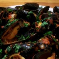 Mussels Luciano · Fresh mussels sauteed with extra virgin olive oil, garlic, and white wine.