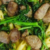 Pasta Veneziani · Sliced sausage and broccoli rabe in olive oil and garlic.