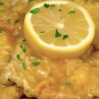Chicken Francese With Pasta · Egg battered chicken in a lemon butter white wine sauce.