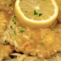 Chicken Francese With Salad · Egg battered chicken in a lemon butter white wine sauce.