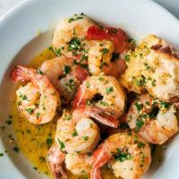 Shrimp Scampi · Served over pasta.