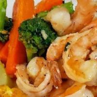 Camarones Mofongo · Shrimp mofongo served with salad and our special mofongo sauce of your choice (red or garlic...