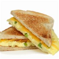 Two Eggs And Cheese Sandwich · Fresh eggs and creamy cheese stuffed in between sandwich bread of your choice.