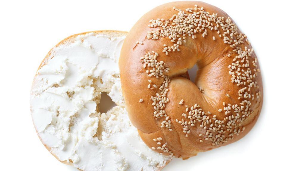 Sesame Bagel With Cream Cheese · Fresh homemade sesame bagel smothered with cream cheese.