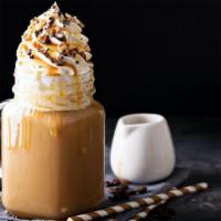 Caramel Latte · Caramel flavored latte with espresso and steamed milk.