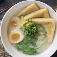Veggie Miso Ramen · Veggie broth, bok choy, corn, scallion, soy sauce marinated  egg, fried tofu, yellow curly n...