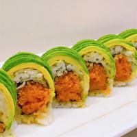 Rock & Roll (8 Pcs.) · Spicy tuna, crunchy flake, topped with avocado.