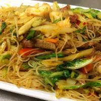 Singapore Chow Mai Fun · Hot and Spicy. Thin rice noodles. Includes chicken, pork, shrimp and beef with curry sauce.