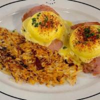 Eggs Benedict · Two poached eggs on english muffin, Canadian bacon, hollandaise sauce.