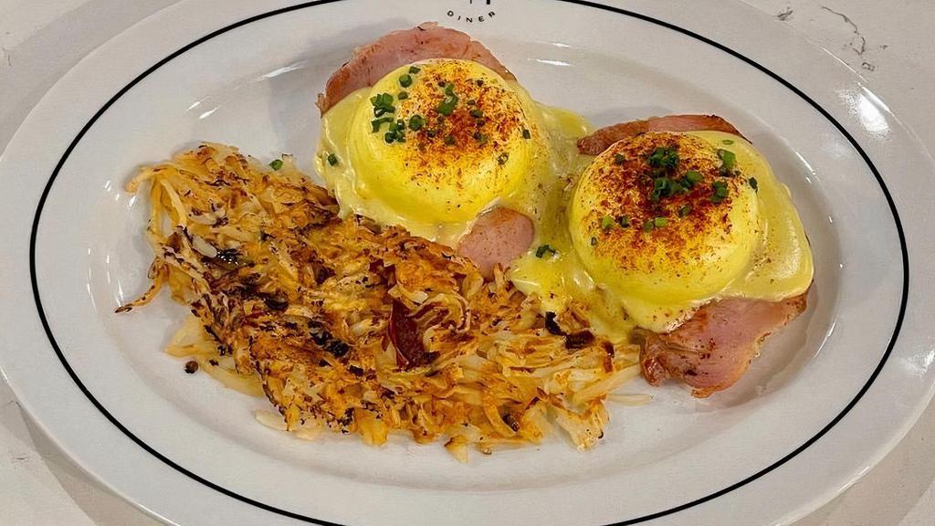 Eggs Benedict · Two poached eggs on english muffin, Canadian bacon, hollandaise sauce.