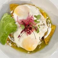 Chilaquiles · Tortillas, spicy tomatillo salsa, crema, avocado, pulled chicken, pickled. onions, queso fre...