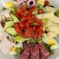 Chef Salad · Lettuce, turkey, roast beef, ham, hard-boiled egg, tomatoes, cucumbers,. swiss, choice of dr...