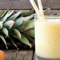 Piña Colada Smoothie · Delicious smoothie made with fresh pineapple, bananas and coconut.