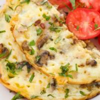 Egg White Mushroom Omelette · Fresh omelette made with eggs whites, low medium Swiss cheese and mushrooms.