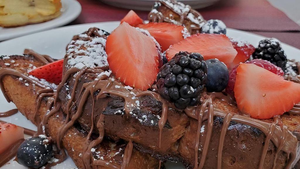 French Toast · Brioche with Nutella and berries.