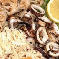 Sofra Seafood Pikilia · Seafood combination of octopus, calamari, and shrimp.