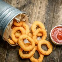 Onion Rings · Golden-crispy onion rings salted to perfection.