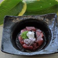 Big Eyes Tuna Tartar · Diced tuna, tobiko, onion, and yuzu sauce.