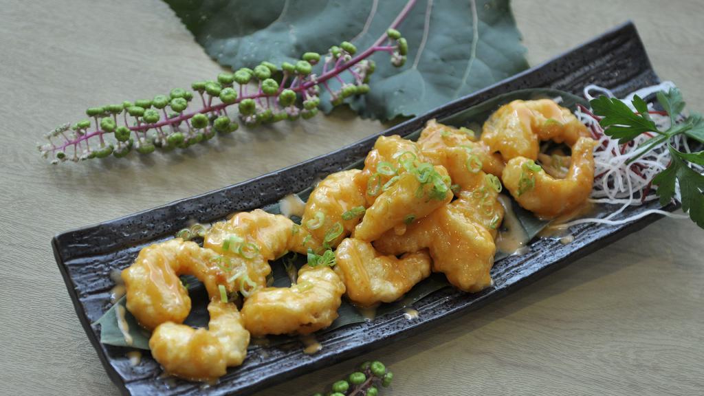 Rock Shrimp Tempura · Batter fried rock shrimp and mixed with spicy yuzu aioli.