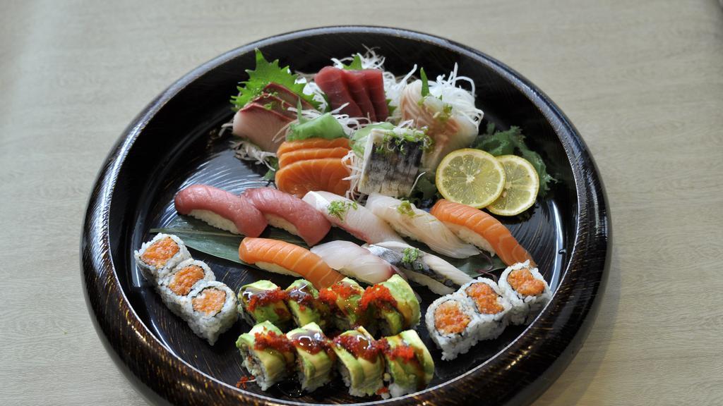 Sushi And Sashimi For Two · 14 pieces sashimi and eight pieces sushi with spicy salmon roll and dragon roll.