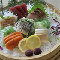 Matsuri Sashimi Deluxe · 18 pieces assorted sliced raw fish.