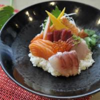 Chirashi · 13 peices assorted raw fish with seasoned sushi rice.