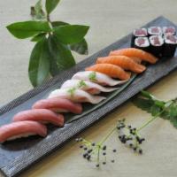 Tri-Color Sushi · Three pieces tuna, three pieces salmon, and three pieces yellowtail with spicy tuna roll.
