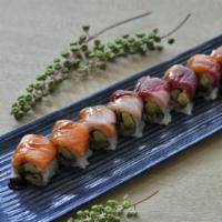 Viking Roll · Eel, avocado, crunchy, topped with tuna, salmon, yellowtail, and eel sauce.