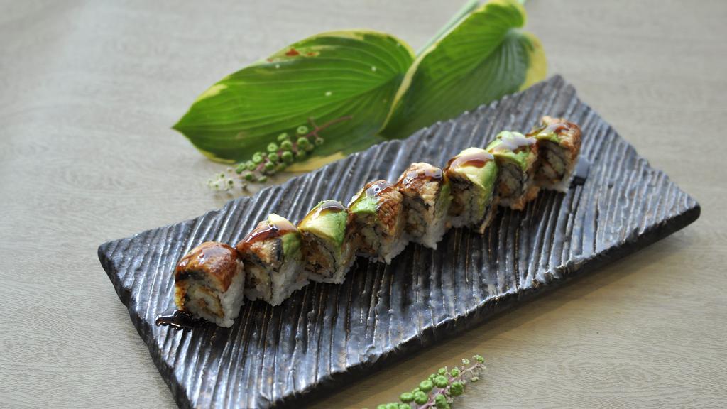 Scorpion King Roll · Softshell crab tempura, cucumber, topped with eel, avocado, and eel sauce.