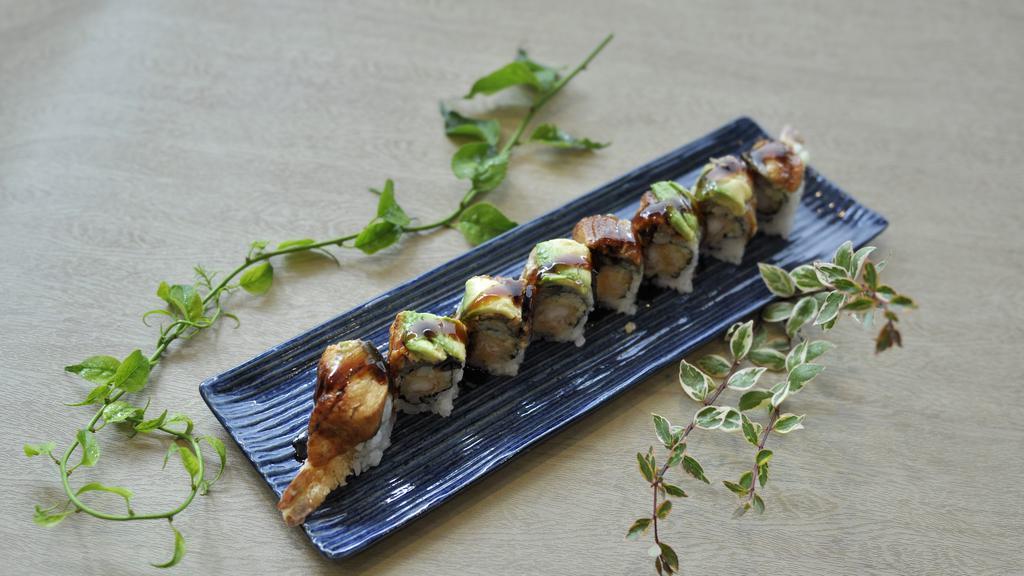 Sea Dragon Roll · Shrimp tempura, cucumber, topped with eel, avocado, and eel sauce.
