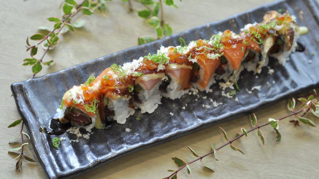 Amazing Roll · Black pepper tuna, tobiko, asparagus, topped with yellowtail, salmon, eel, ikura, scallion, crunchy, and chef.