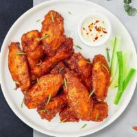 Fried Flying Wings · Fresh crispy chicken wings. Five pieces.