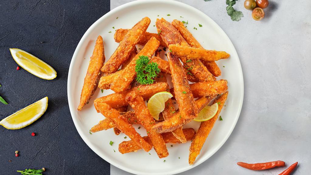 Sweet Potato Fries · Freshly cut onions lightly battered and fried until golden crisp. Served with marinara sauce.