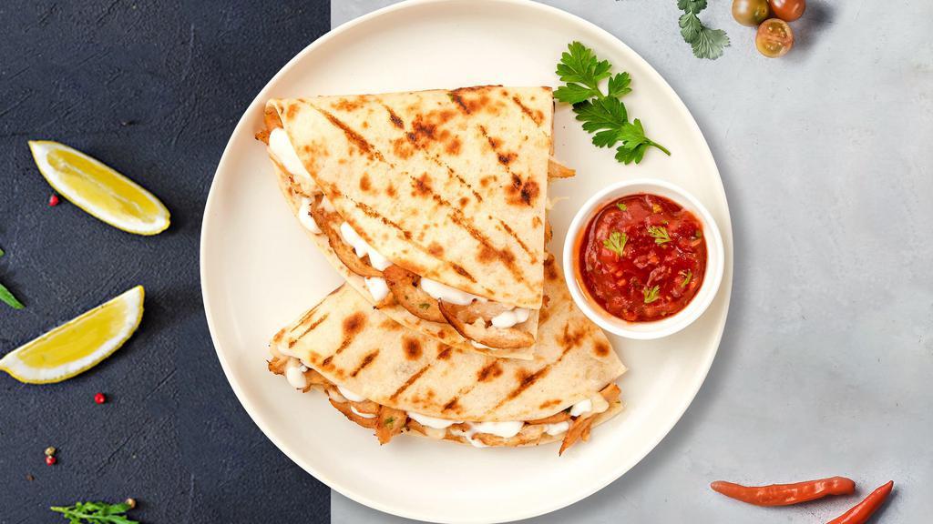 Johnny Pastrami Quesadilla · Pastrami wrapped with cheese in a grilled tortilla with pico de gallo.