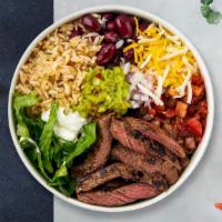 Rah-Rah Carne Asada Bowl · Grilled steak topped with sour cream, salsa, cheese, and spanish rice served in a bowl.