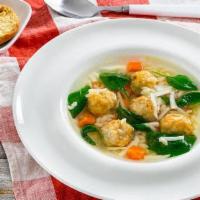 Italian Wedding · Chicken soup with egg drop, fresh spinach and meatballs.