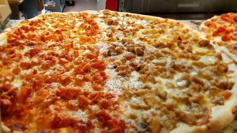 Extra Large Buffalo Chicken · Chicken tossed in our homemade spicy buffalo sauce topped with mozzarella.