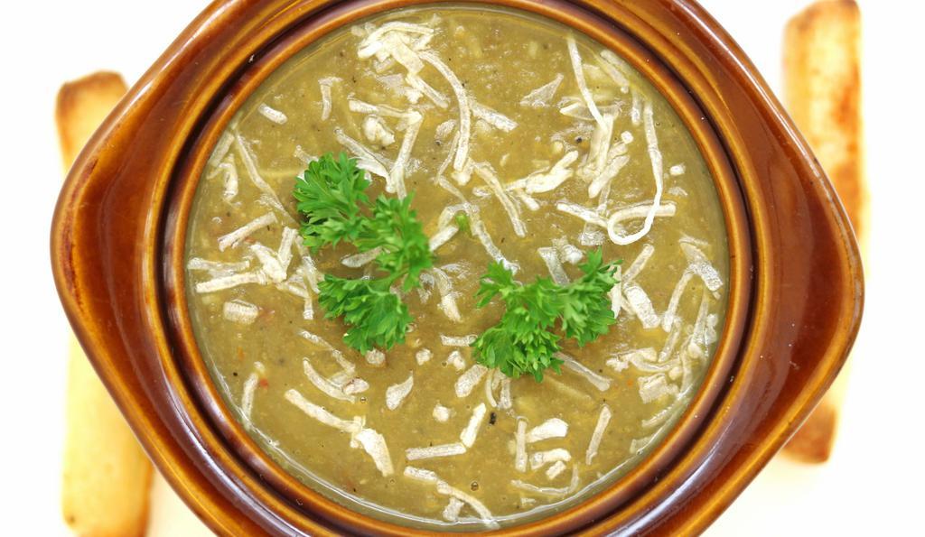 Lentil & Coconut Soup · Gluten free. Tender lentils in hearty stock, topped with sweet and toasted coconut.