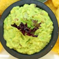 Guacamor · Gluten free. Mashed avocados with diced onions, tomatoes, cilantro and lime juice, served wi...