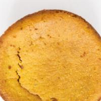 Torta Maduro Muffin · A delicious combination of Sweet plantains, young stone ground corn, Coconut flakes and ging...