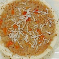 Arroz Con Leche · Gluten free. Vegan dominican-style hot rice pudding with toasted coconut, cinnamon, nutmeg t...