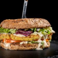 Veggie Sandwich · Fresh mushrooms, artichokes, mozzarella, tomatoes, and spinach on your choice of bread. Serv...