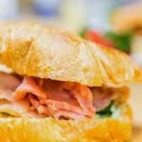 Lox Sandwich · Yummy eggs, tomatoes, avocado, onion, lox, and mayo on your choice of bread. Served with sal...