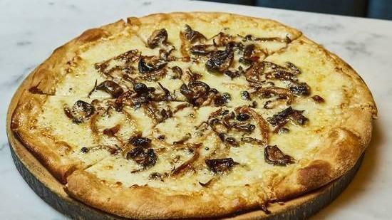 Mushroom Pizza · Sauteed Mushrooms, Gruyere Cheese and Truffle Zest