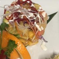 Seafood Cake · Avocado, scallops, mango and crab meat.