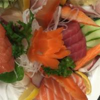 24 Piece Large Sashimi · Salmon, tuna, red snapper, yellowtail, octopus and surf clam.