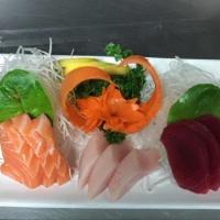 15 Piece Medium Sashimi · Salmon, tuna, red snapper and yellowtail.
