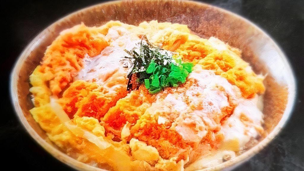 Katsu Don · Pork loin katsu over rice with special sauce and miso soup.