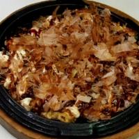 Okonomiyaki Seafood · Japanese style hot-plate pizza with seafood.